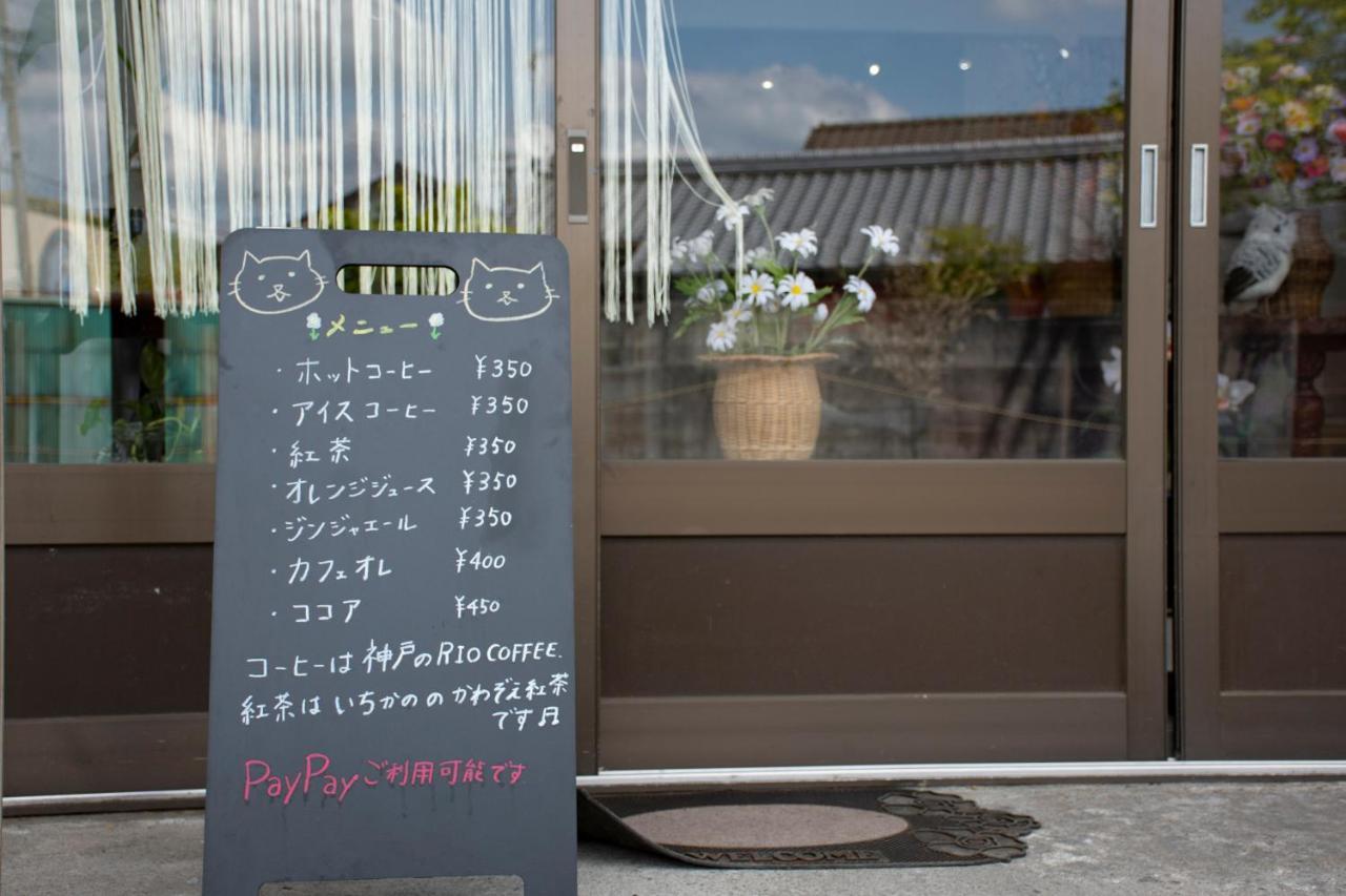 Готель Guest Cafe Kuchikumano Kamitondacho Екстер'єр фото